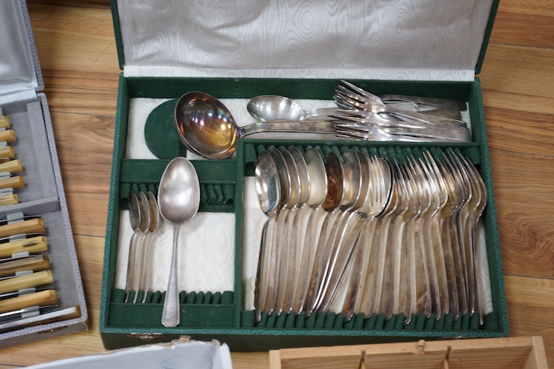 French silver plated flatware, a set of horn-handled cutlery, a silver plated tea tray and plated knife rests. Condition - fair to good